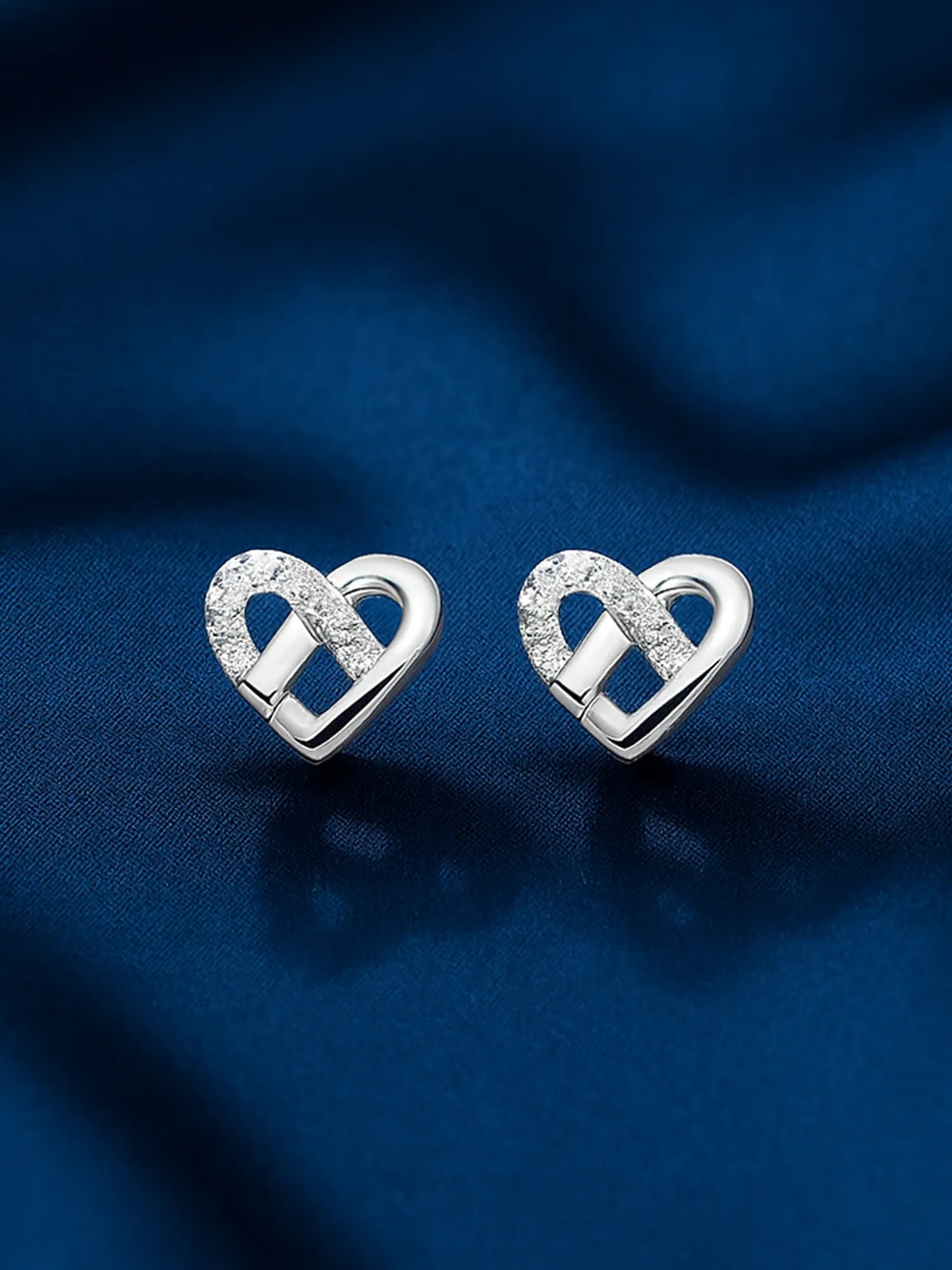 Sylvexia Silver Interlocked Heart Crystal Stud Earrings