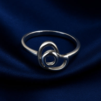 silver abstract loop ring with modern circular design for women